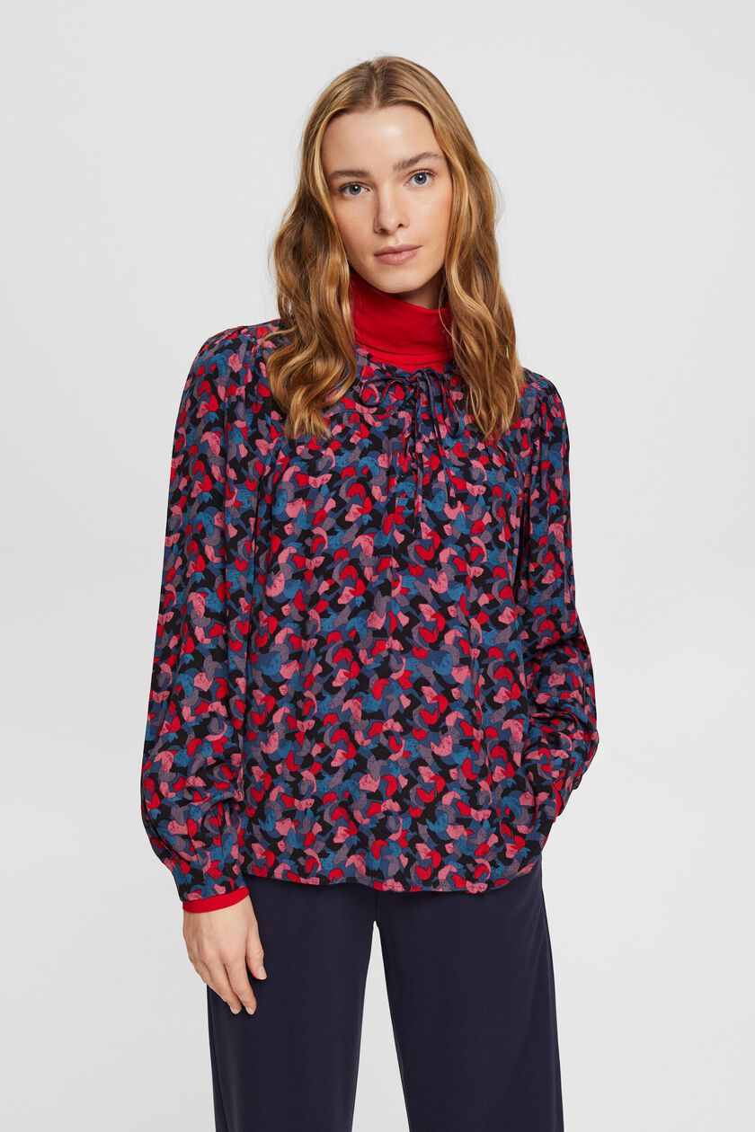 Patterned blouse with tie detail